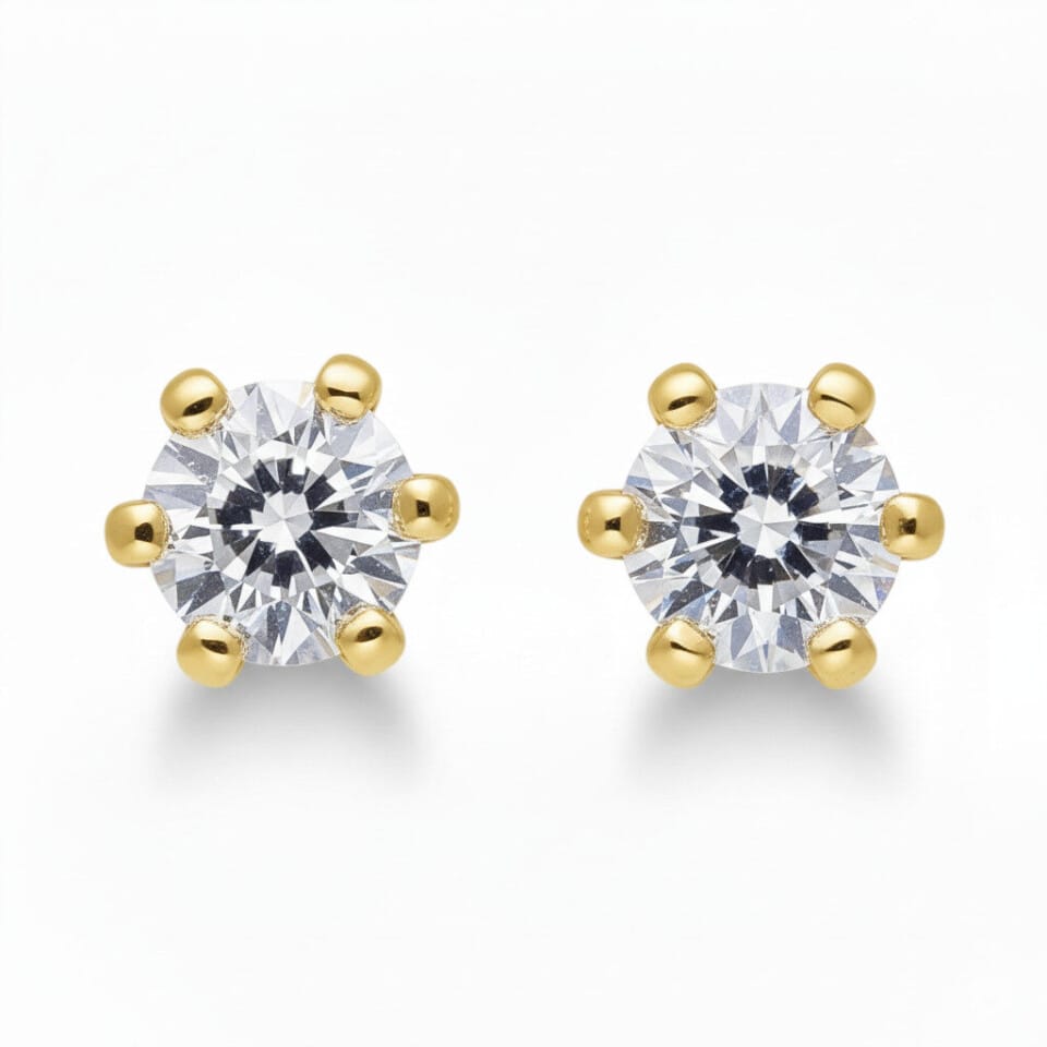 Klasyczne złote kolczyki na sztyft z brylantami 0.20 ct