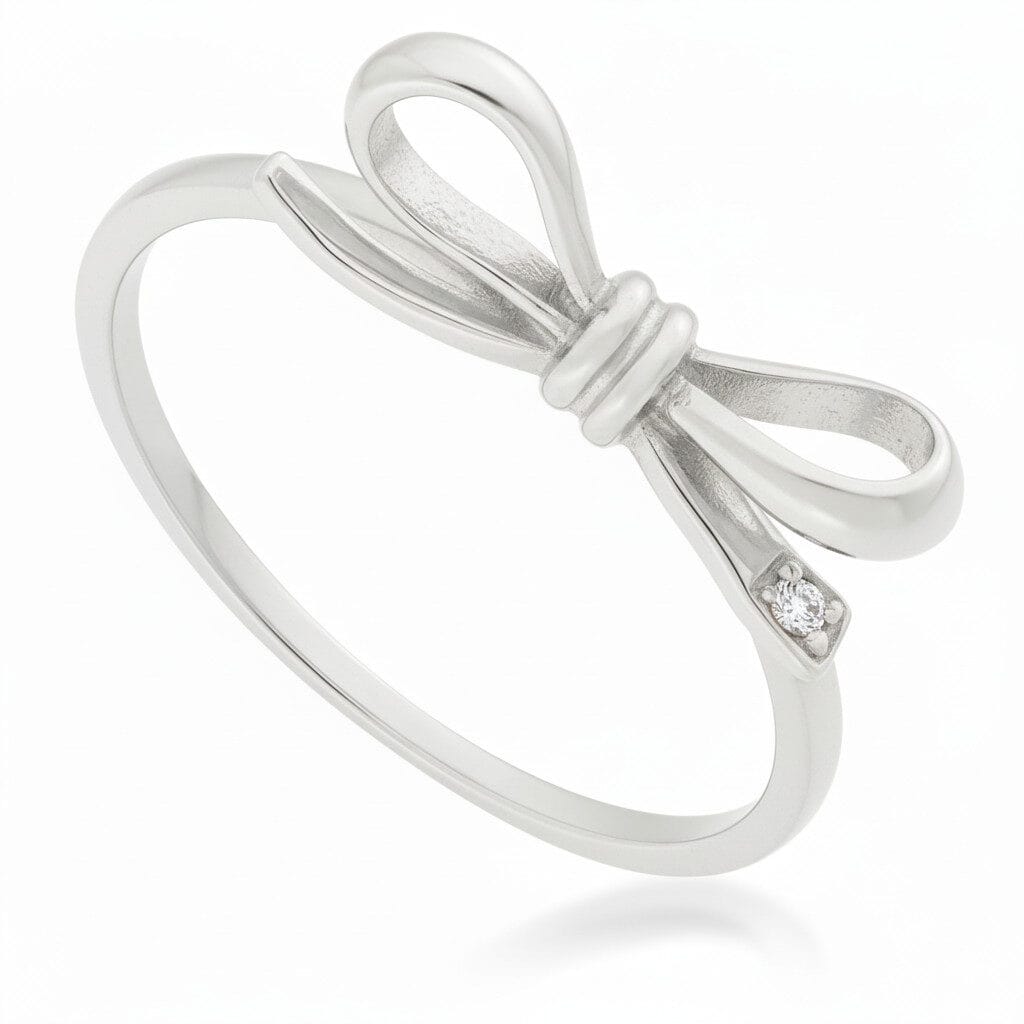 Pierścionek Kokardka białe złoto z diamentem GESELLE