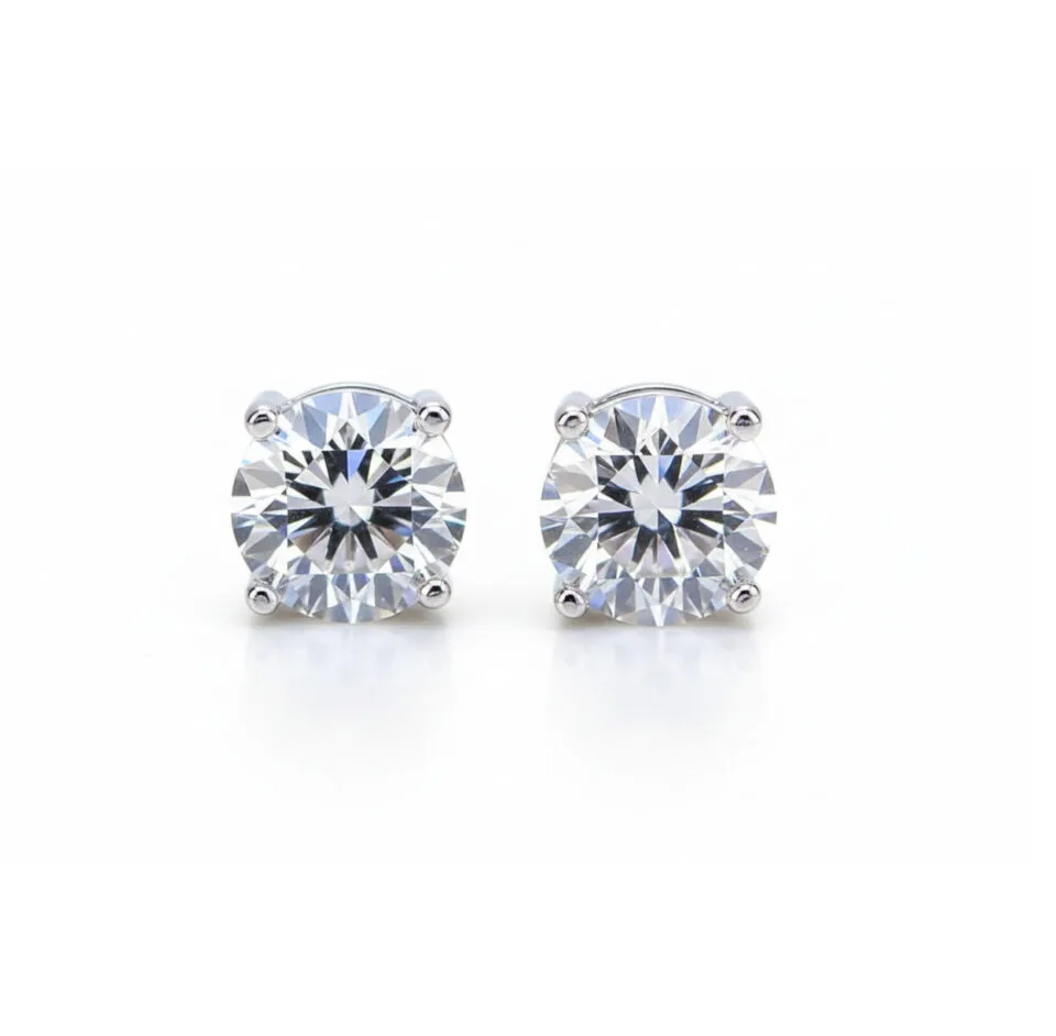 Klasyczne kolczyki diamentowe z oprawą w cztery pazurki w białym złocie na sztyft z brylantami 0.40 ct