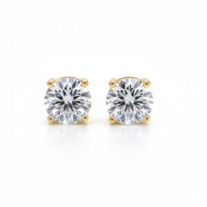 Klasyczne kolczyki diamentowe z oprawą w cztery pazurki w żółtym złocie na sztyft z brylantami 0.60 ct