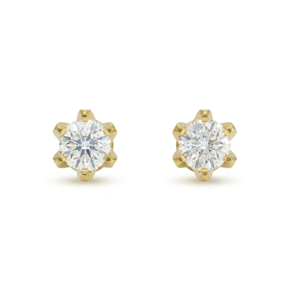 Klasyczne kolczyki diamentowe z oprawą w sześć pazurków w żółtym złocie na sztyft z brylantami 0.60 ct
