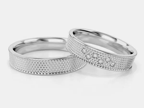 Obrączki ślubne z białego złota damska z kamieniami model ST-338