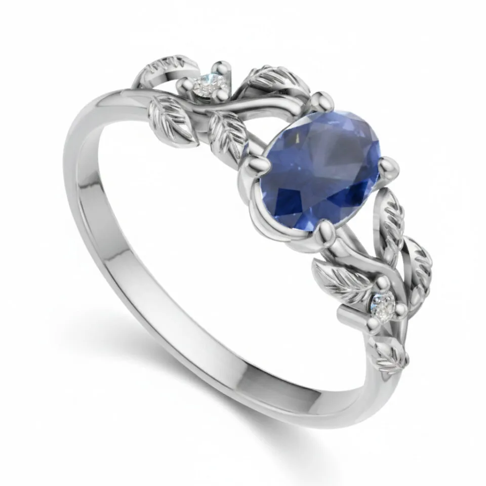 Pierścionek zaręczynowy Ornelia z białego złota z szafirem i diamentami GESELLE