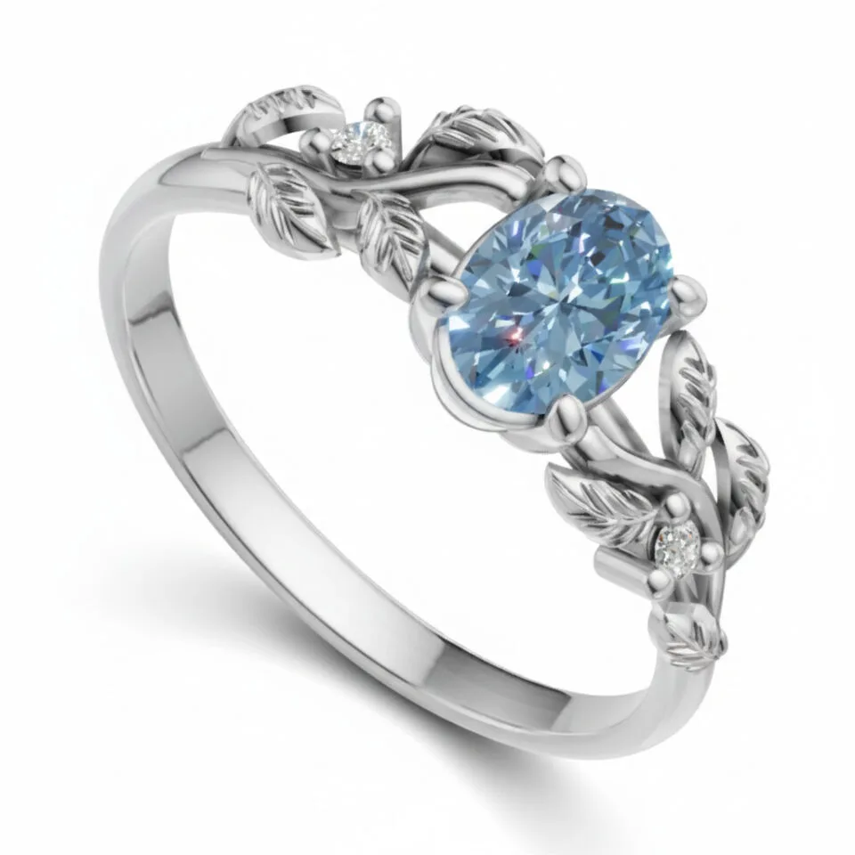 Pierścionek zaręczynowy Ornelia z białego złota z topazem i diamentami GESELLE