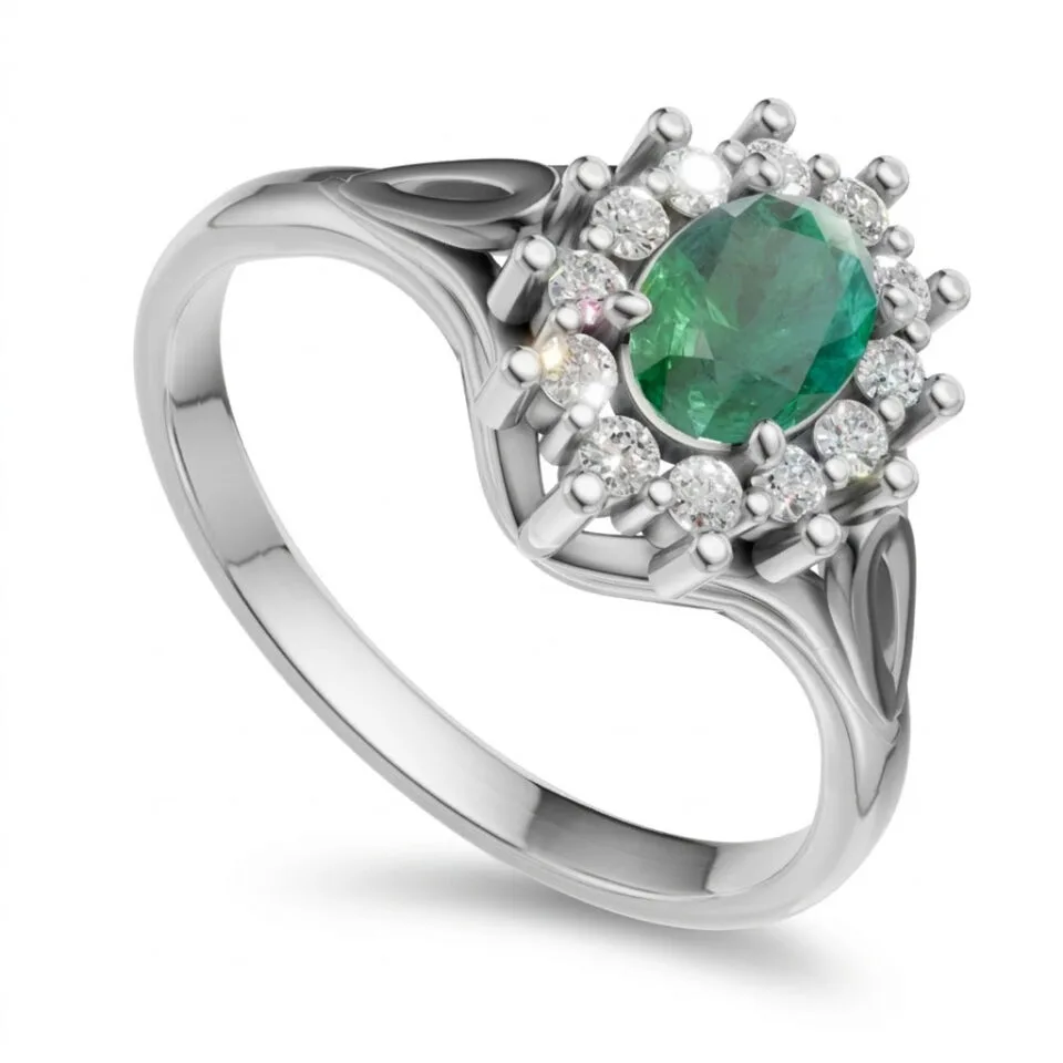 Pierścionek zaręczynowy Regalia z białego złota z owalnym szmaragdem oraz diamentami GESELLE