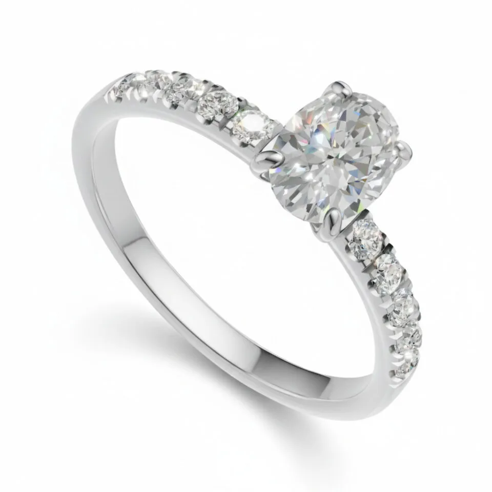 Pierścionek zaręczynowy Valentina w białym złocie z diamentem laboratoryjnym w szlifie owalnym oraz kamieniami bocznymi 0.70 ct