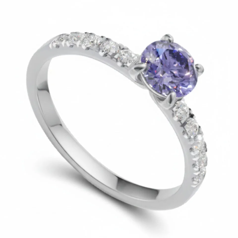 Pierścionek zaręczynowy Valerina w białym złocie z tanzanitem oraz diamentami bocznymi 0.15 ct
