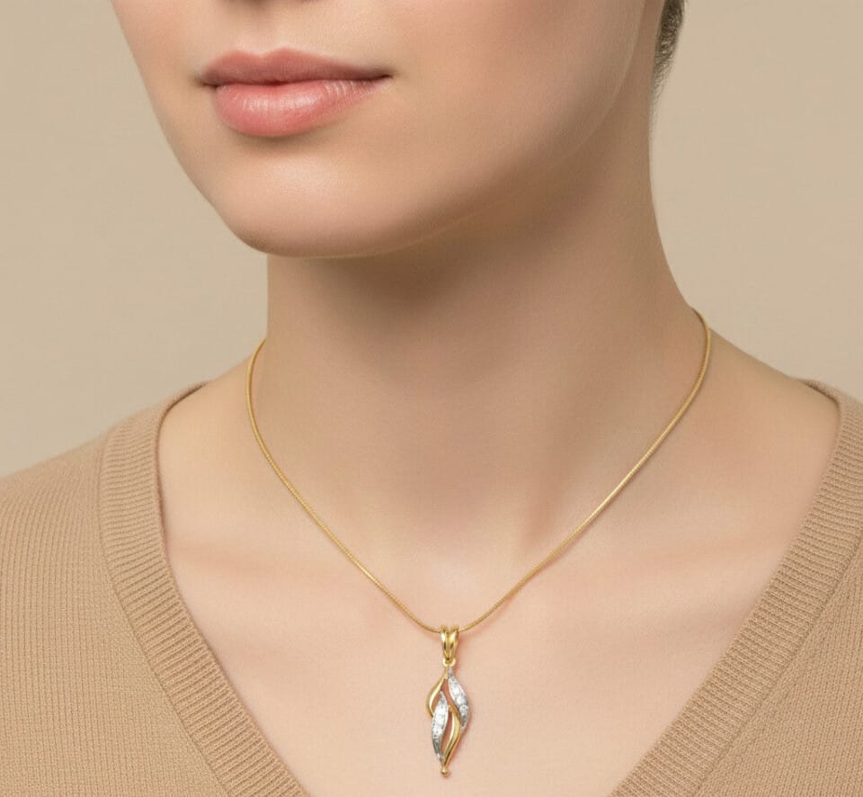 Zawieszka z żółtego złota z cyrkoniami popiersie