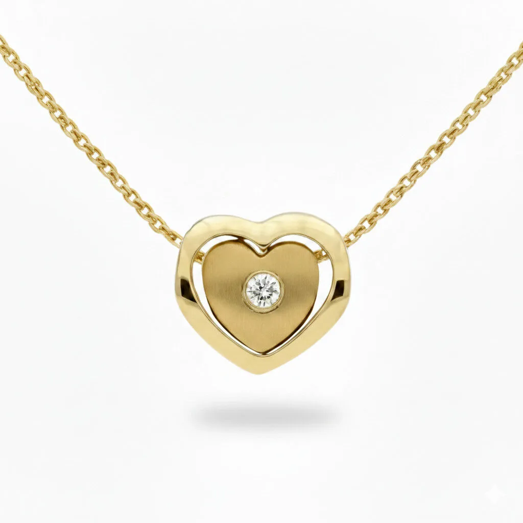 Złota zawieszka serduszko z diamentem 0.02 ct