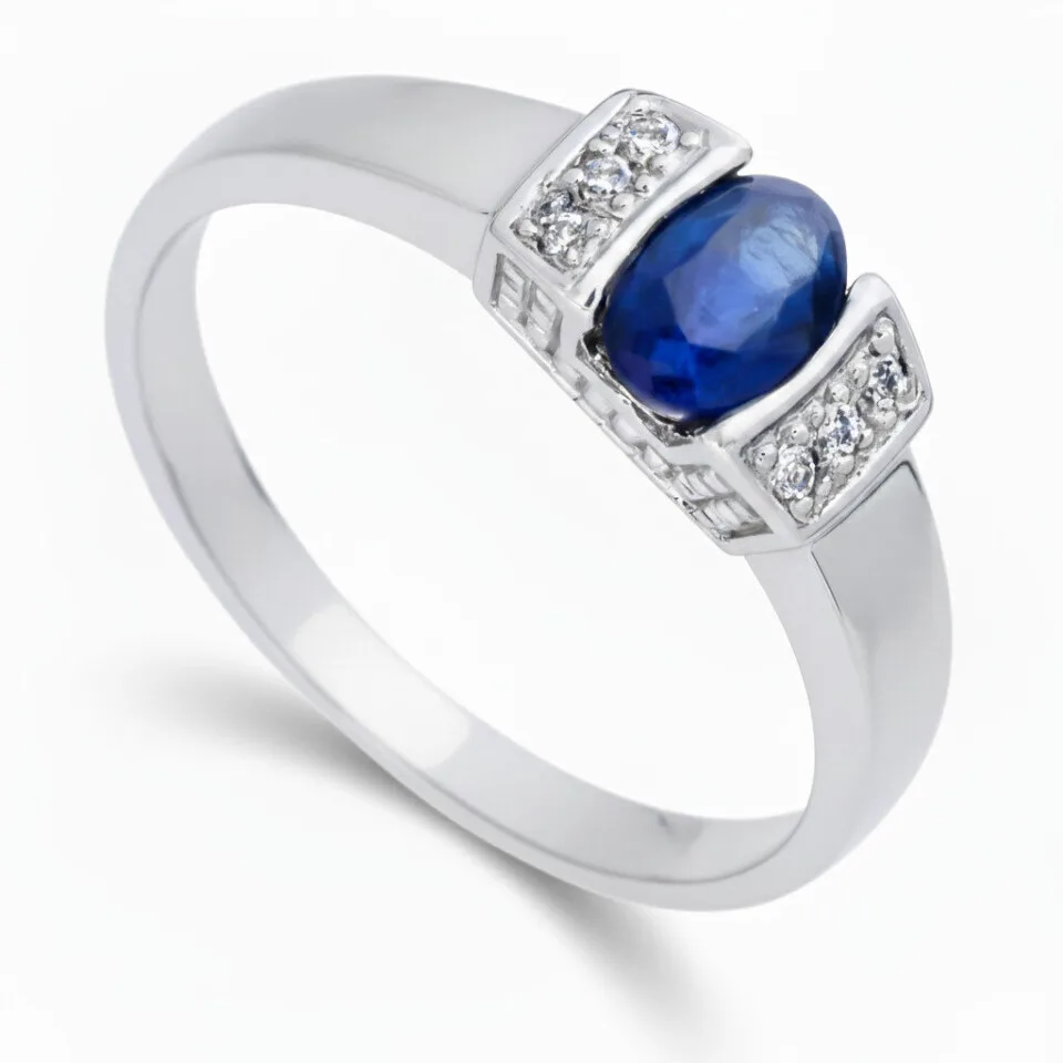 Pierścionek zaręczynowy z białego złota Horizon z owalnym szafirem i diamentami
